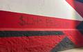 Muro da sede do Flamengo e pichado com critica a Samuel Lino (Foto: Reproducao / ge