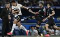 Sergio Ramos agride atacante do Pumas (Foto: Yuri Cortez / AFP