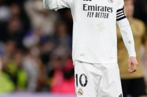 Luka Modric com a camisa do Real (Foto: Divulgacao / Real)