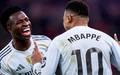 Vinicius Junior comemora o gol marcado pelo Real Madrid contra o Benfica, na Champions League. (Foto: Divulgacao / Real Madrid