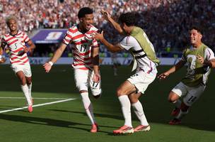 Comemoracao dos jogadores da selecao dos Estados Unidos (Foto: Charlotte Wilson/AFP)